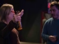 Two member of the audience enjoying the Brooklyn Brewery craft beers.